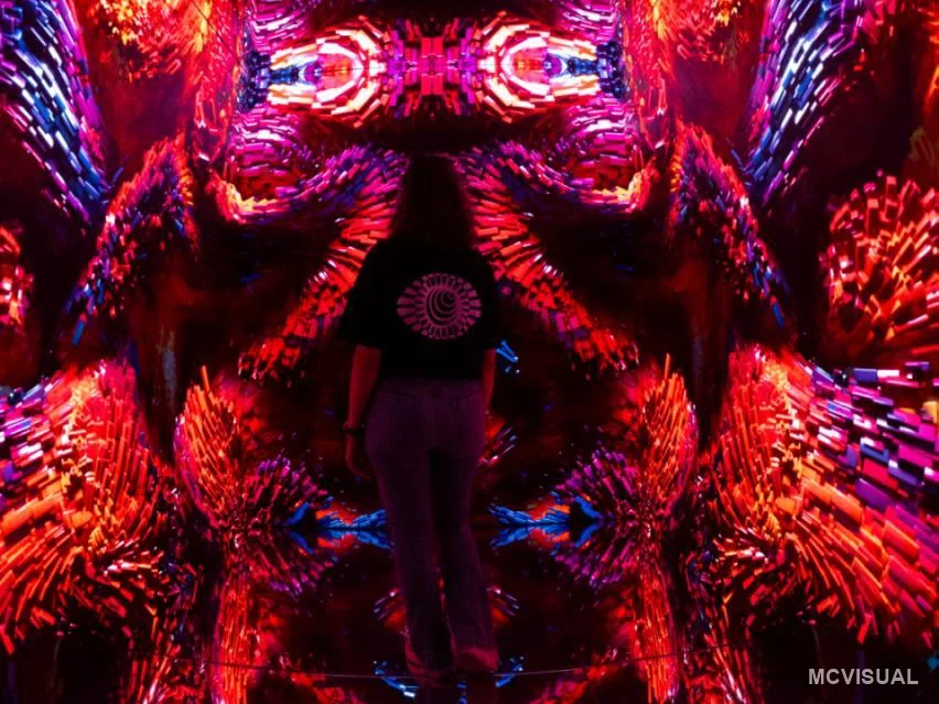 Immersive attraction, Bulgaria — Mirrored content wrapping all three walls. The corners are the hard part — content has to run into the join, not stop at