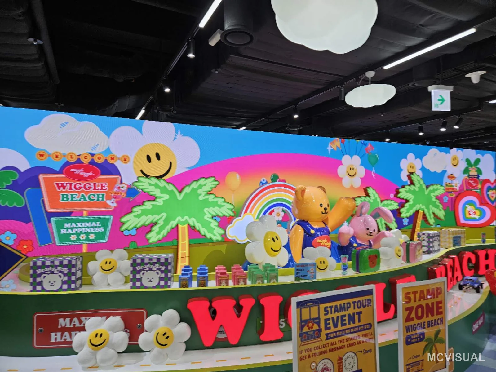 Wiggle Wiggle store, South Korea — The wall follows the room and turns the corner behind the ball pit. Content is authored for the actual developed length,