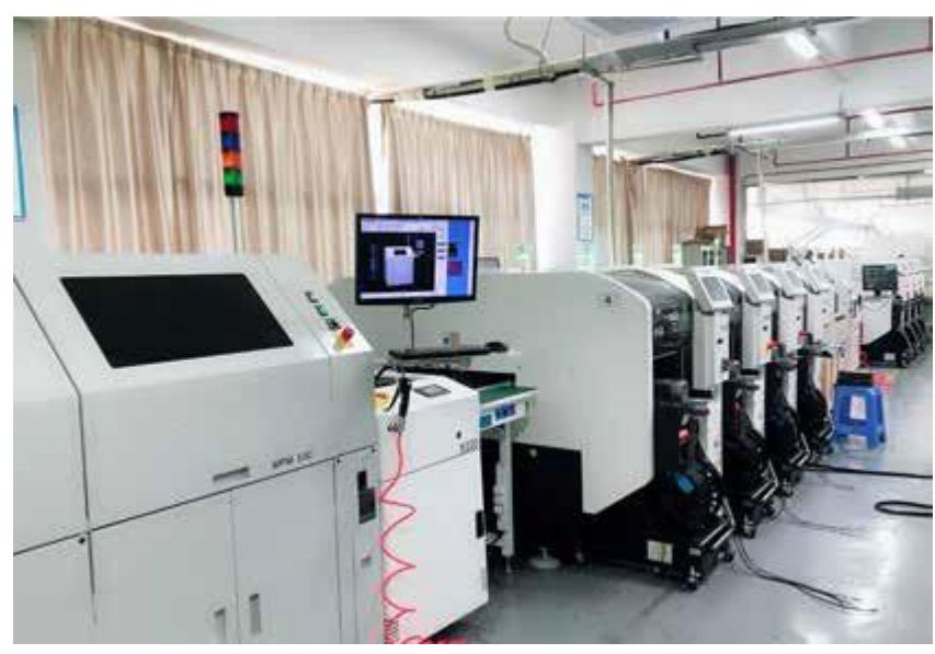 MPM solder-paste printer feeding the SMT line